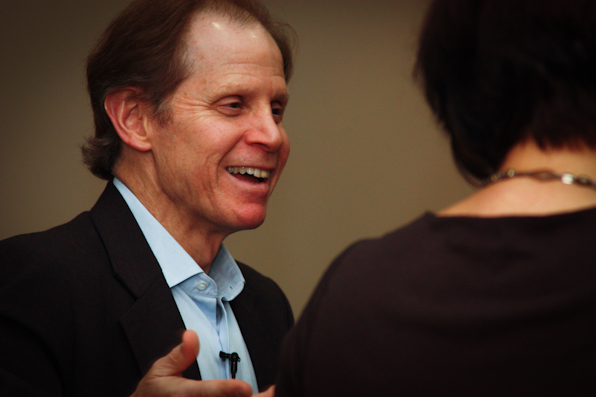 Dr. Dan Siegel sharing a laugh during &quot;Parenting for the 21st Century&quot;